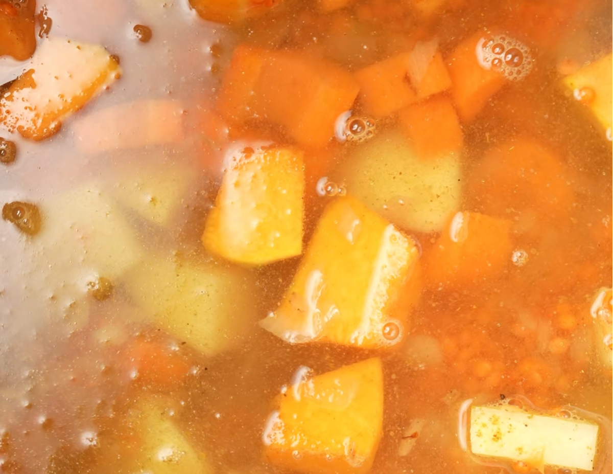 Pour-in-8-cups-of-water-or-vegetable-broth.-Bring-the-mixture-to-a-gentle-boil-vegetables-and-lentils-are-tender