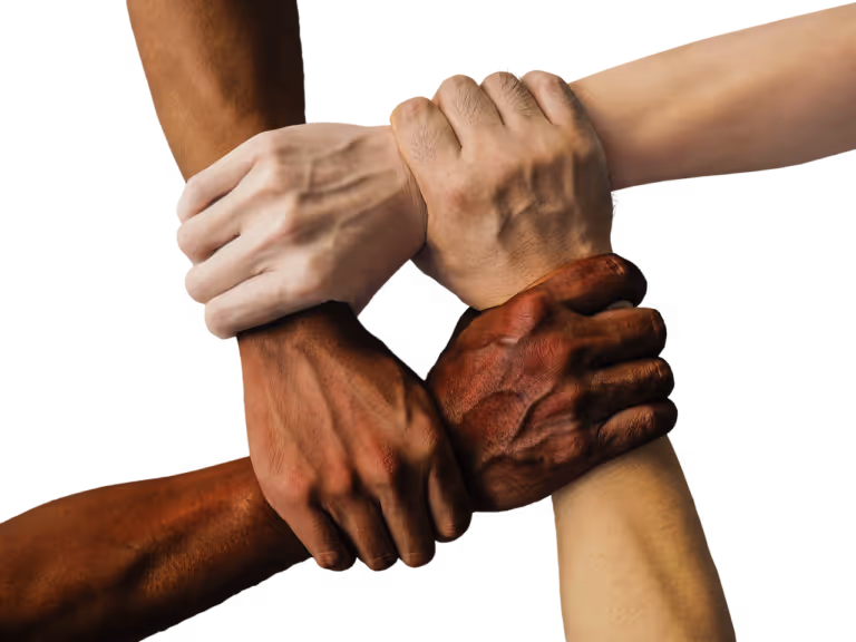 Group of diverse hands stacked together showing teamwork, friendship, and social connection for stress relief - representing the 5-minute connection habit for lowering stress