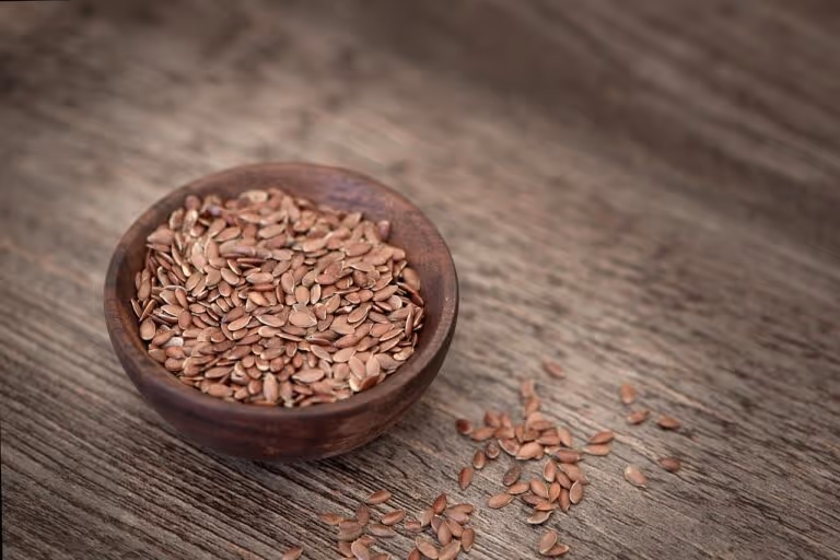 Bowl of flax seeds - a fiber-rich food that supports gut health and helps reduce inflammation through SCFA production