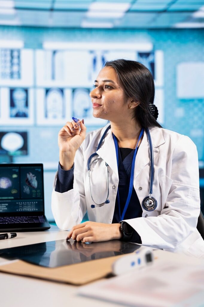 Woman consulting with a doctor about getting a PCOS endocrinologist referral, representing patient advocacy and navigating healthcare for hormone health